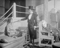 Margalo Gillmore as Consuela, Frank Reicher (center) as Mancini, Richard Bennett as HE, New York, 1922
